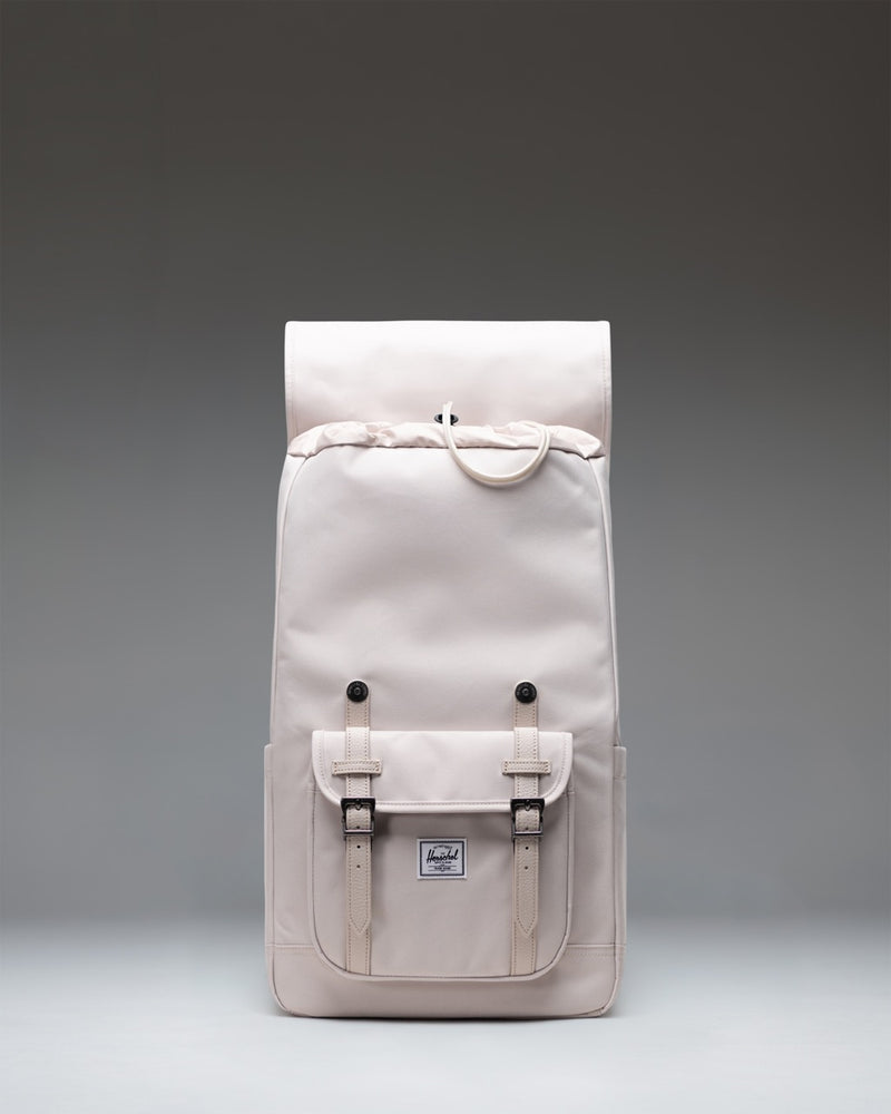 Herschel Little America Backpack in Moonbeam, an off-white classic mountaineering-style backpack with dual rubber straps.