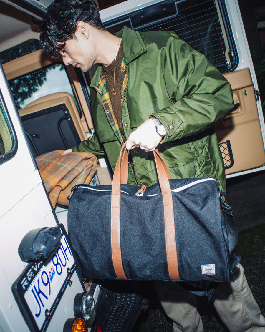 Herschel Novel Duffle Bag size guide chart. Dimensions: Height: 11.75 inches, Width: 20.5 inches, Depth: 11 inches. Capacity: 42.5 Liters.