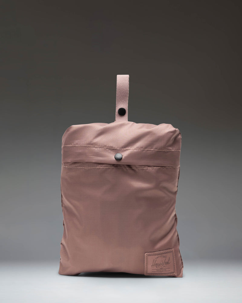 Herschel Supply Co. Portland Packable Tote in Ash Rose Tonal, a lightweight, foldable tote bag in a muted dusty rose pink color.