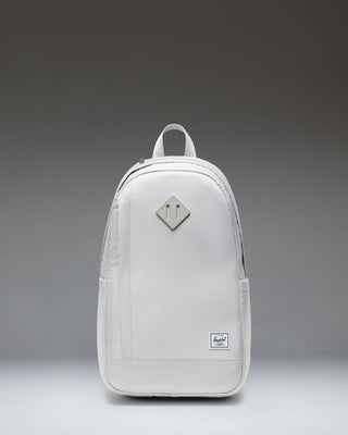Herschel Supply Co. Seymour Backpack in Metal. Front view of the grey backpack with a front zipper pocket and classic Herschel logo.