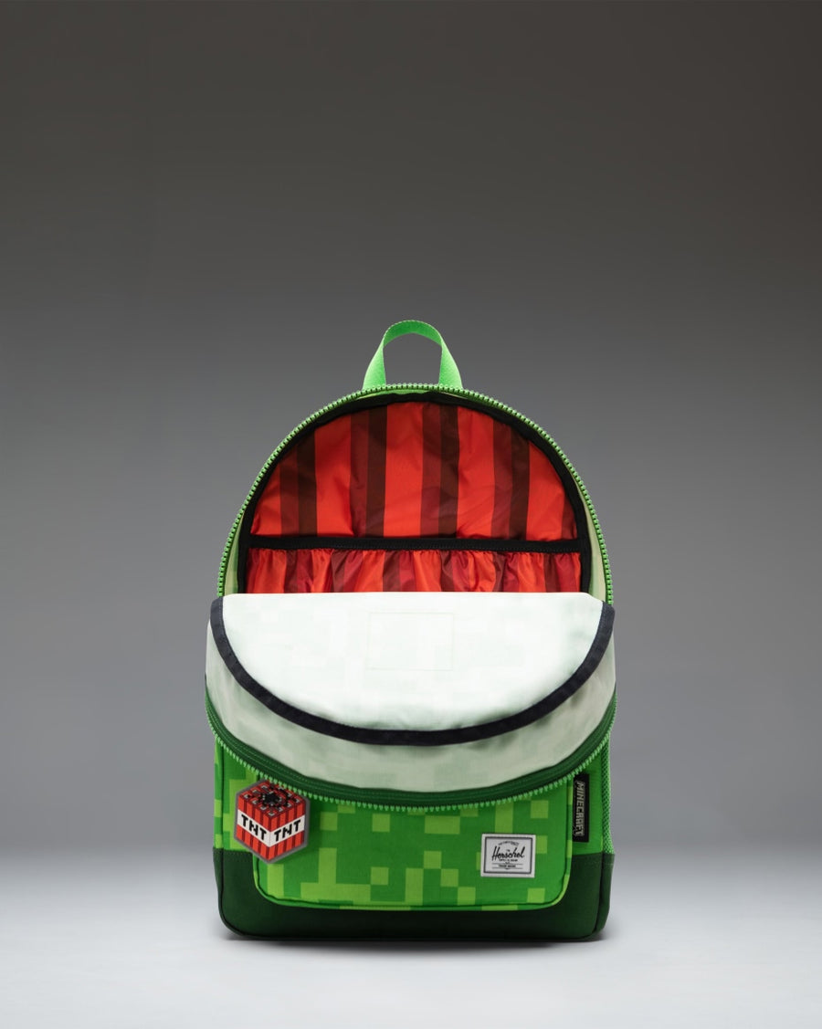Minecraft Herschel Heritage Youth Backpack in the green pixelated Creeper pattern.