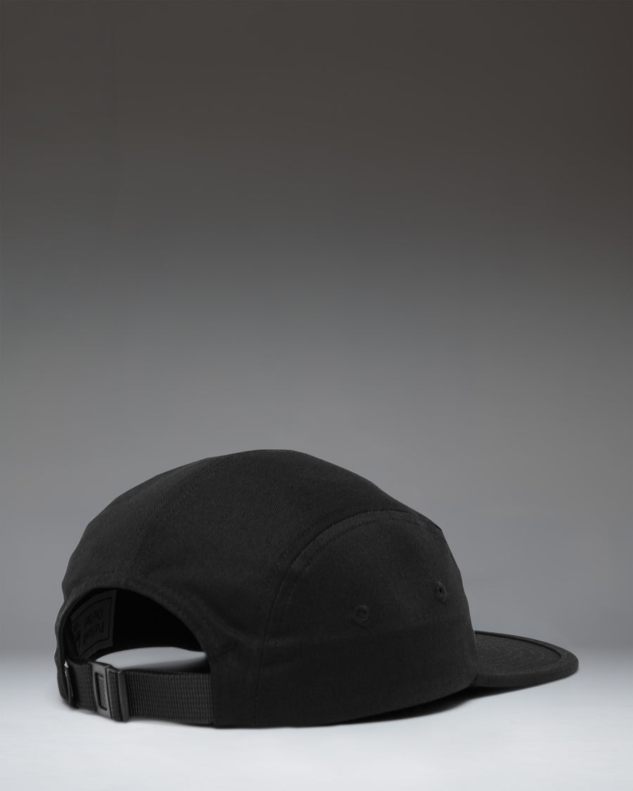 Herschel Supply Co. Glendale Kids Cap in black, featuring a classic five-panel design with an adjustable strap and the brand's signature logo.