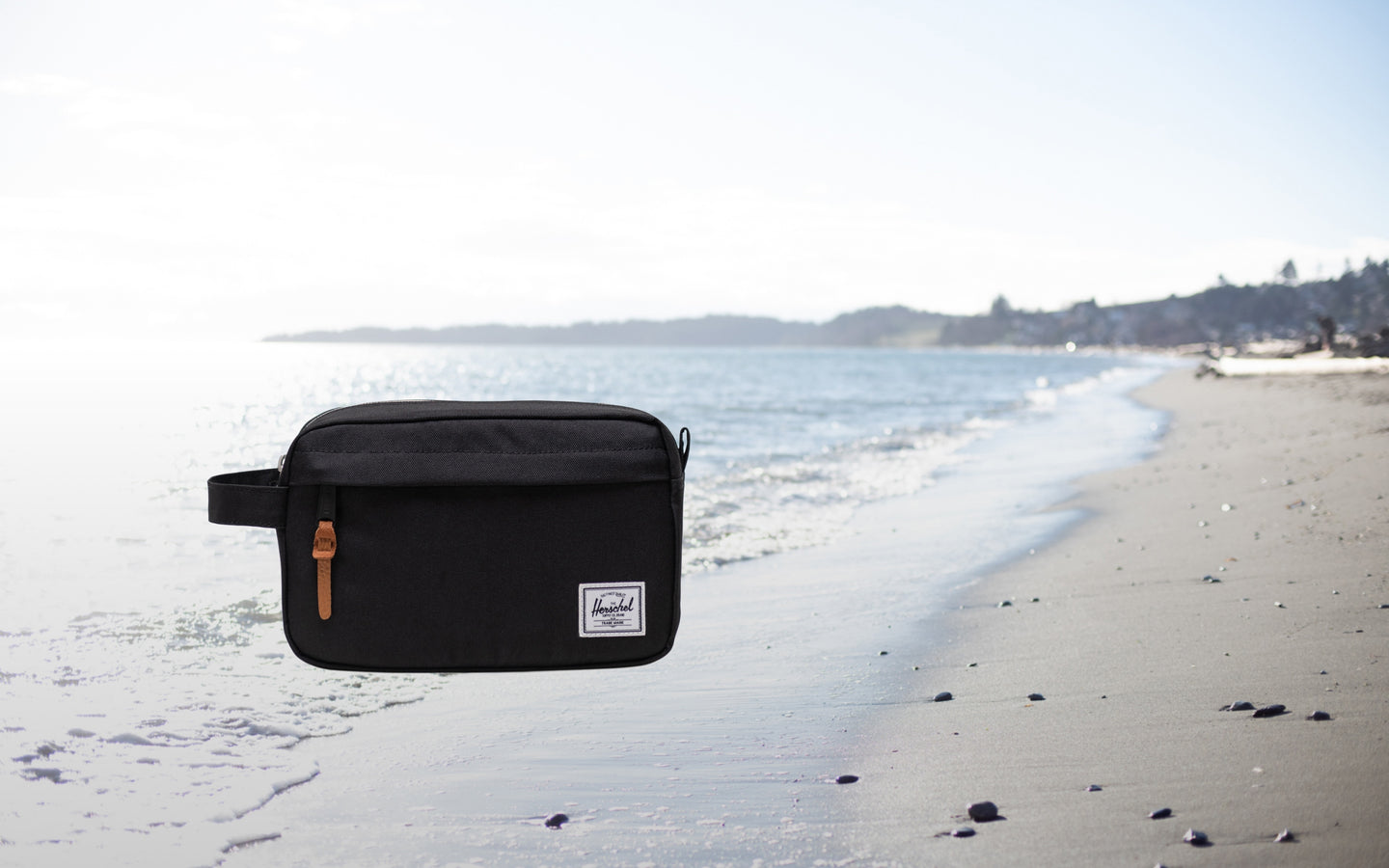 Herschel Supply Co. Chapter Travel Kit in classic black, shown from a front angle on a clean background.